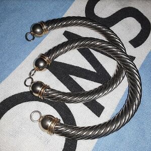 Two matching gold and silver twisted cuff bracelet